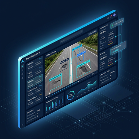 YNMDrishti road dashboard — dashcam frame with detected potholes and damaged road, severity and GPS readouts alongside